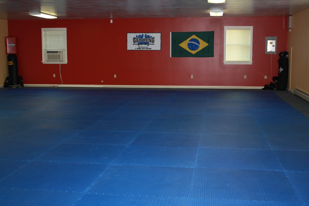 red mixed martial arts grappliing interlocking floor puzzle mat system