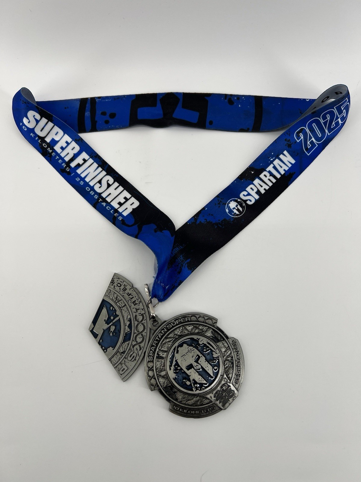 Spartan Super 2025 Finisher Medal Silver Blue 10 Kilometers 25 Obstacles