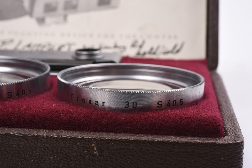 Contax counter with original case and instruction manual.