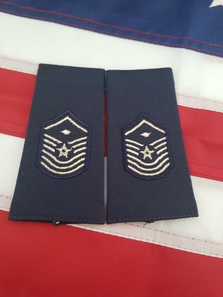 2 Air Force senior master sergeant with 1st Sergeant device shoulder marks