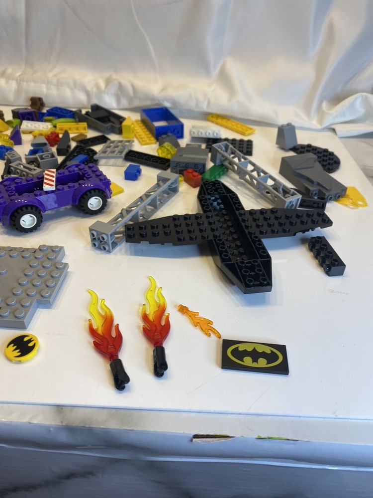 lego blocks and 3 figures with booklet