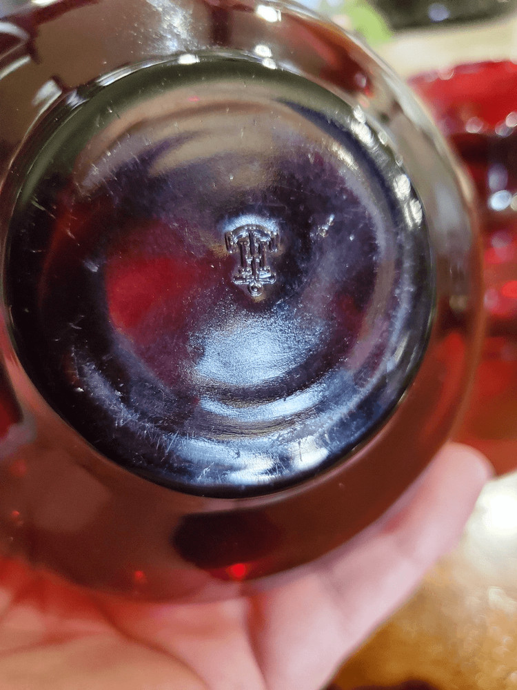 Two anchor Hocking Ruby Red bud vases