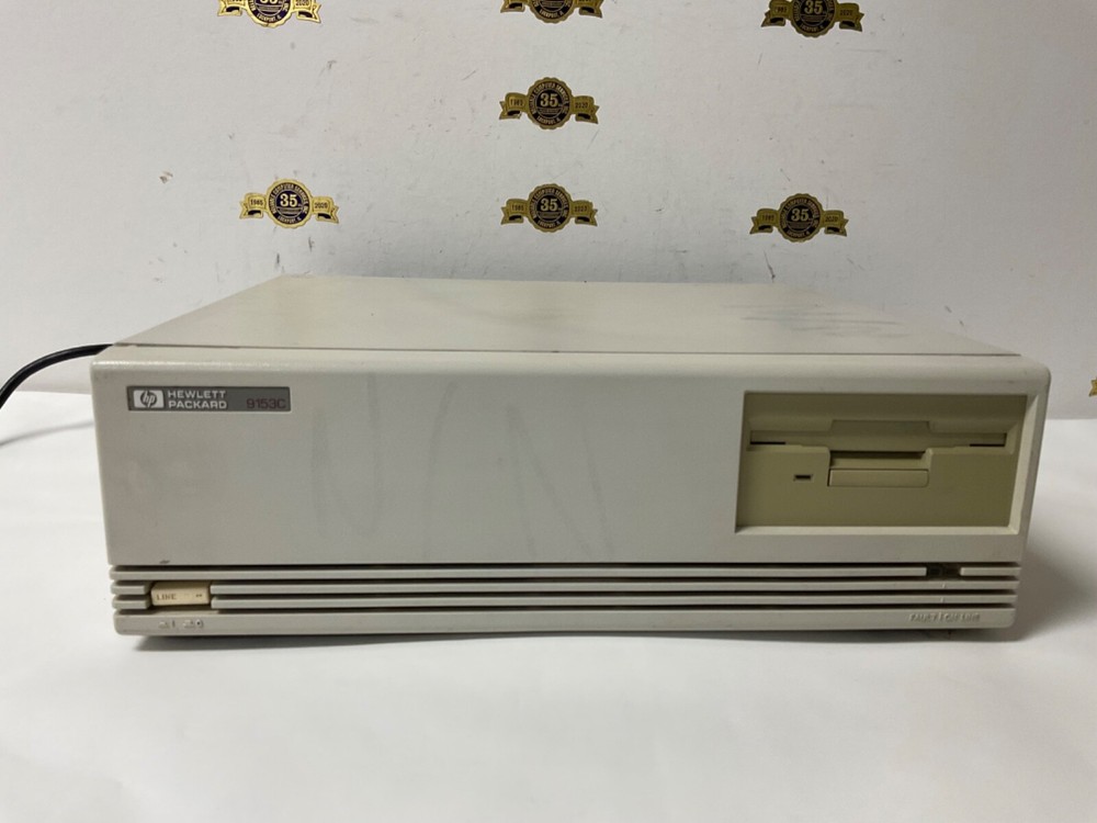 Hewlett Packard 9153C Workstation drive box Floppy Powers up