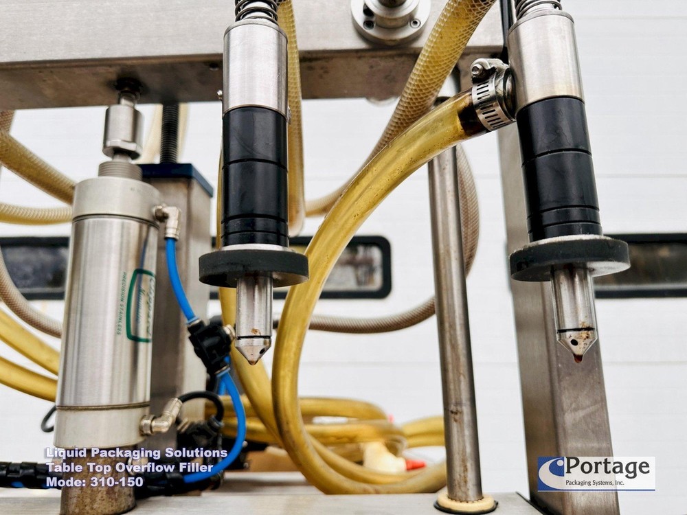 Liquid Packaging Solutions Model: 310-150 || Semi-Automatic Table Top Overflow