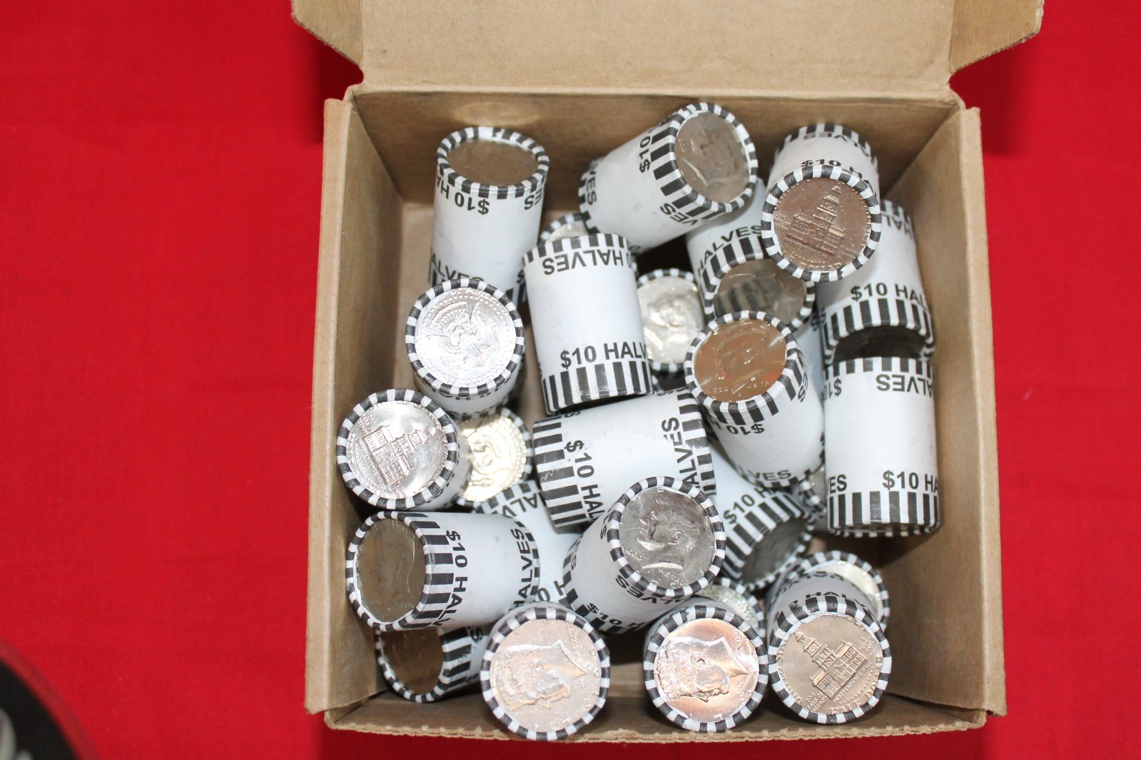 LOOK! CHEAPEST PRICE ON EBAY KENNEDY HALF DOLLAR BANK ROLL SEALED AND UNSEARCHED