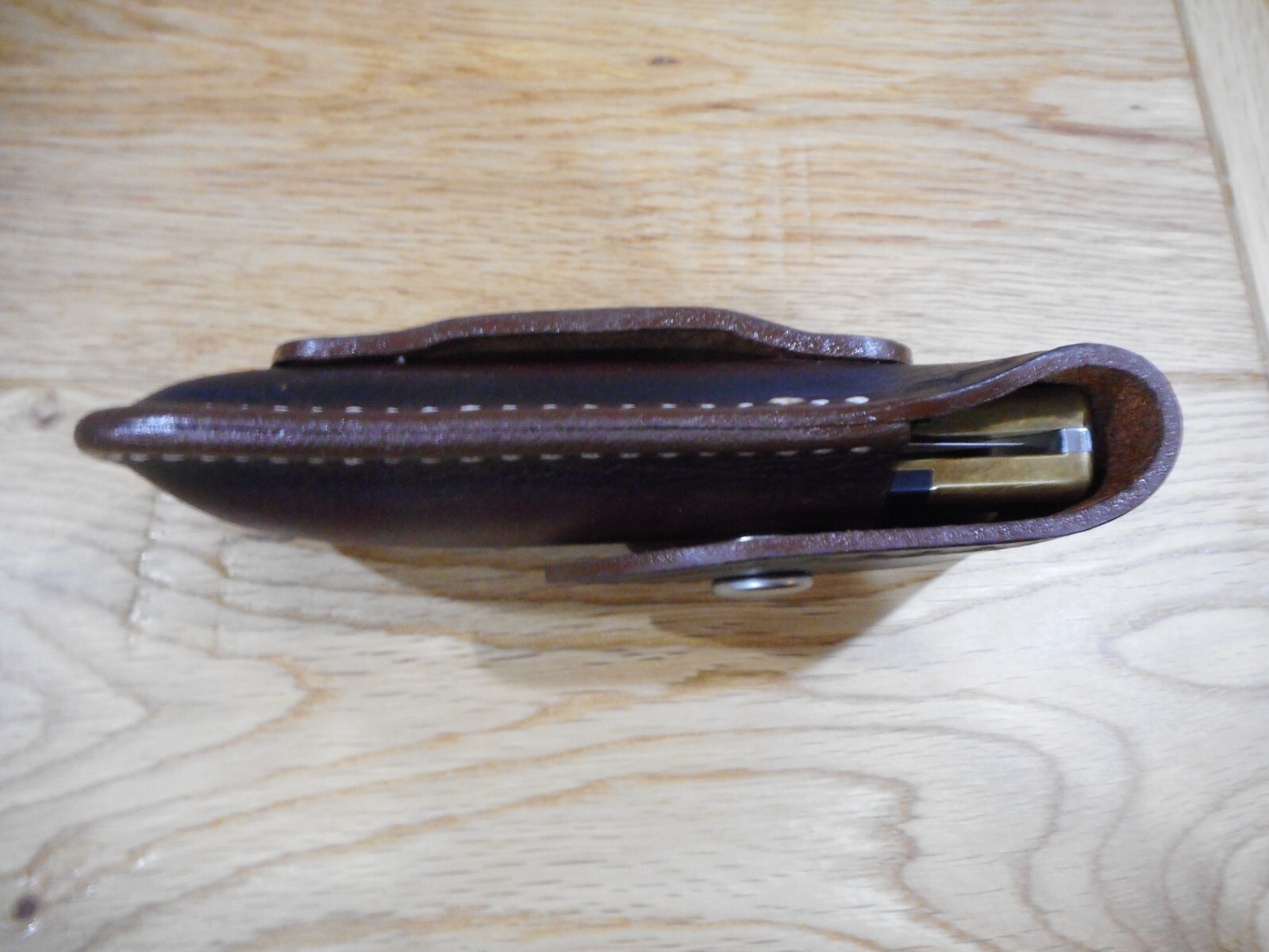 Buck 110 custom leather knife sheath. Brown. Tooled flap. Sheath only