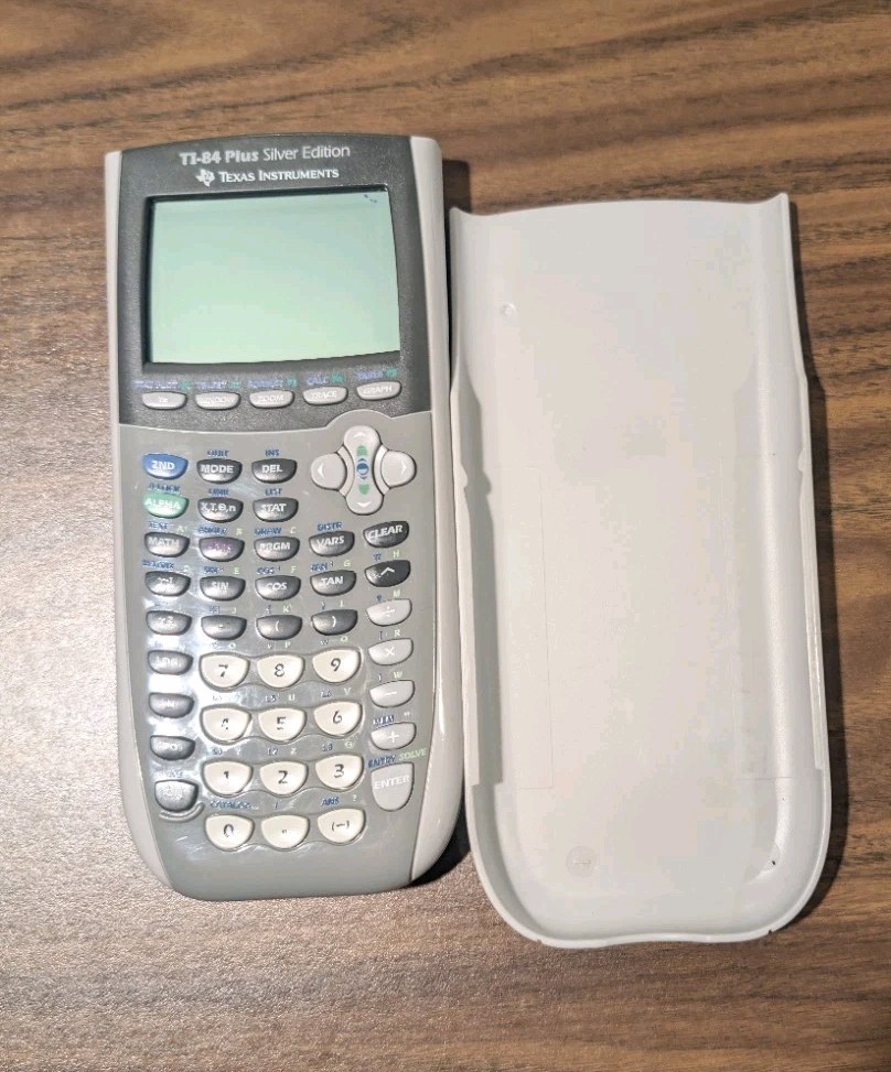 Texas Instruments TI-83 Plus Silver Edition Graphing Calculator White Case