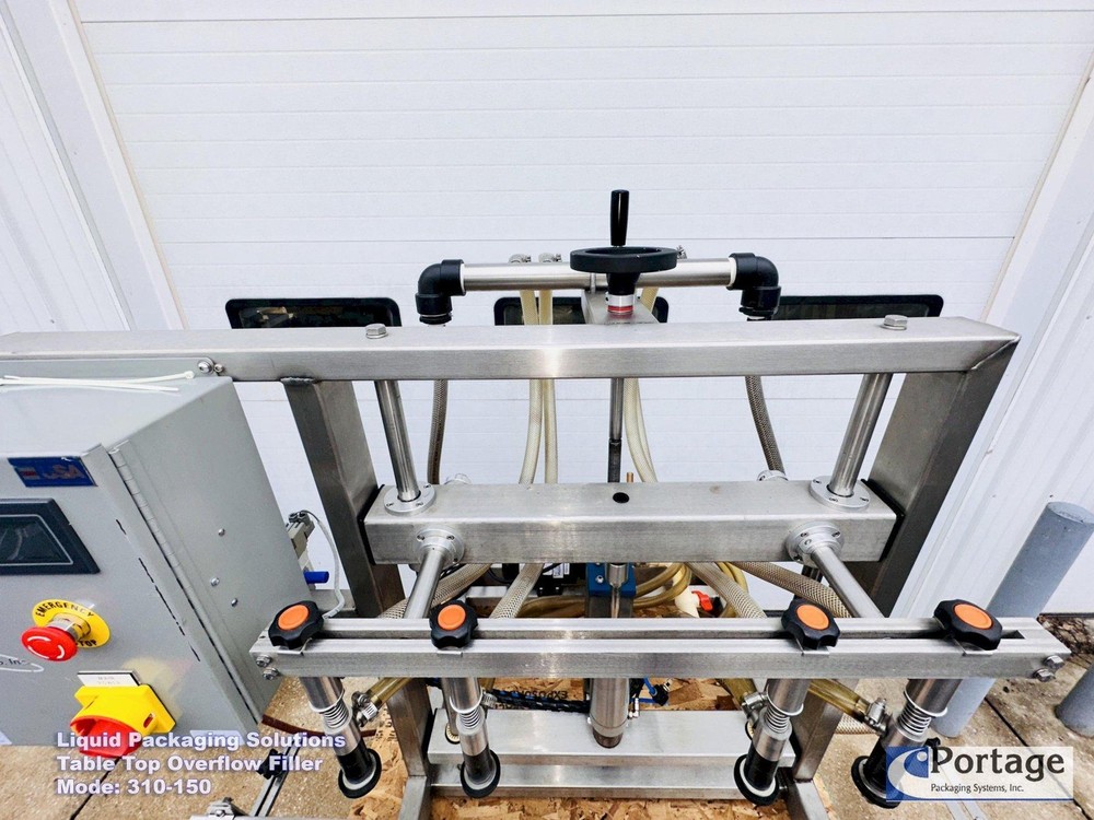 Liquid Packaging Solutions Model: 310-150 || Semi-Automatic Table Top Overflow