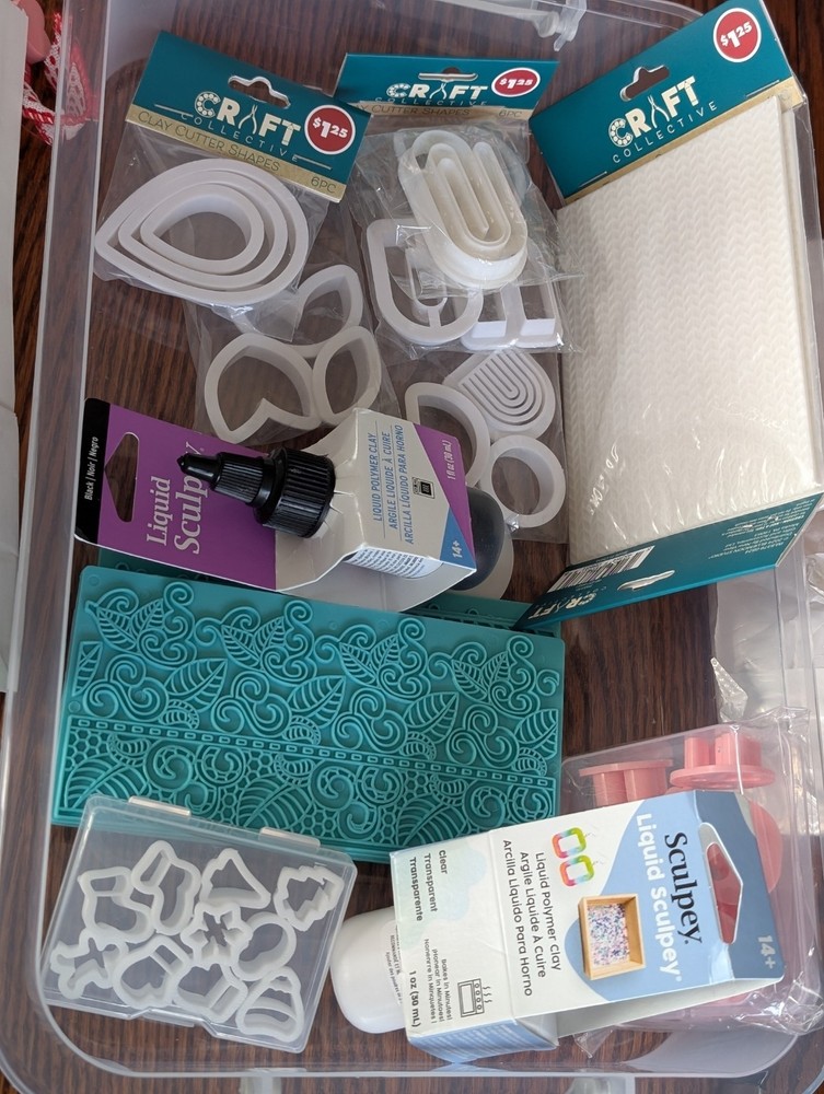 CLAY CUTTERS AND sculpey liquid clay and texture sheets.