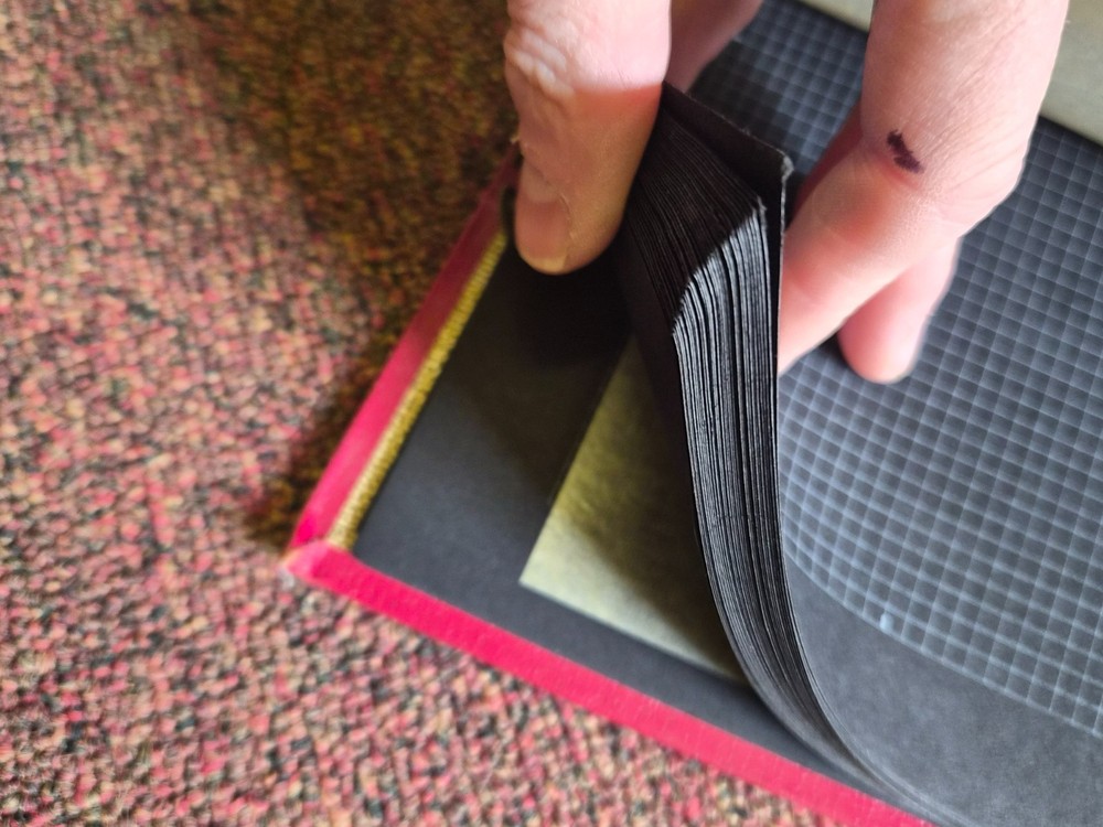 Vintage 1960's Red spring back Stamp Album with black leaves with interleaving