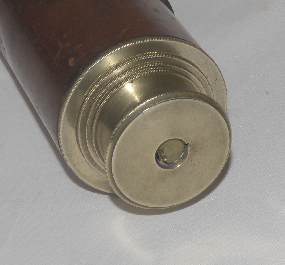 Telescope by E. & E. Emanuel with engraved nobility motif.