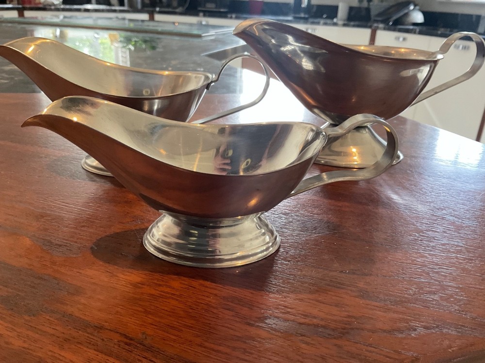 THREE SILVER COLOUR SAUCE BOATS GRADUATED