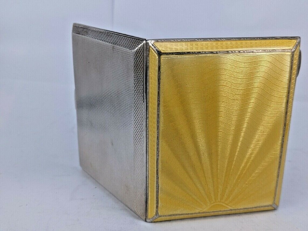 1932 high Art deco yellow guilloche sunburst pattern silver case