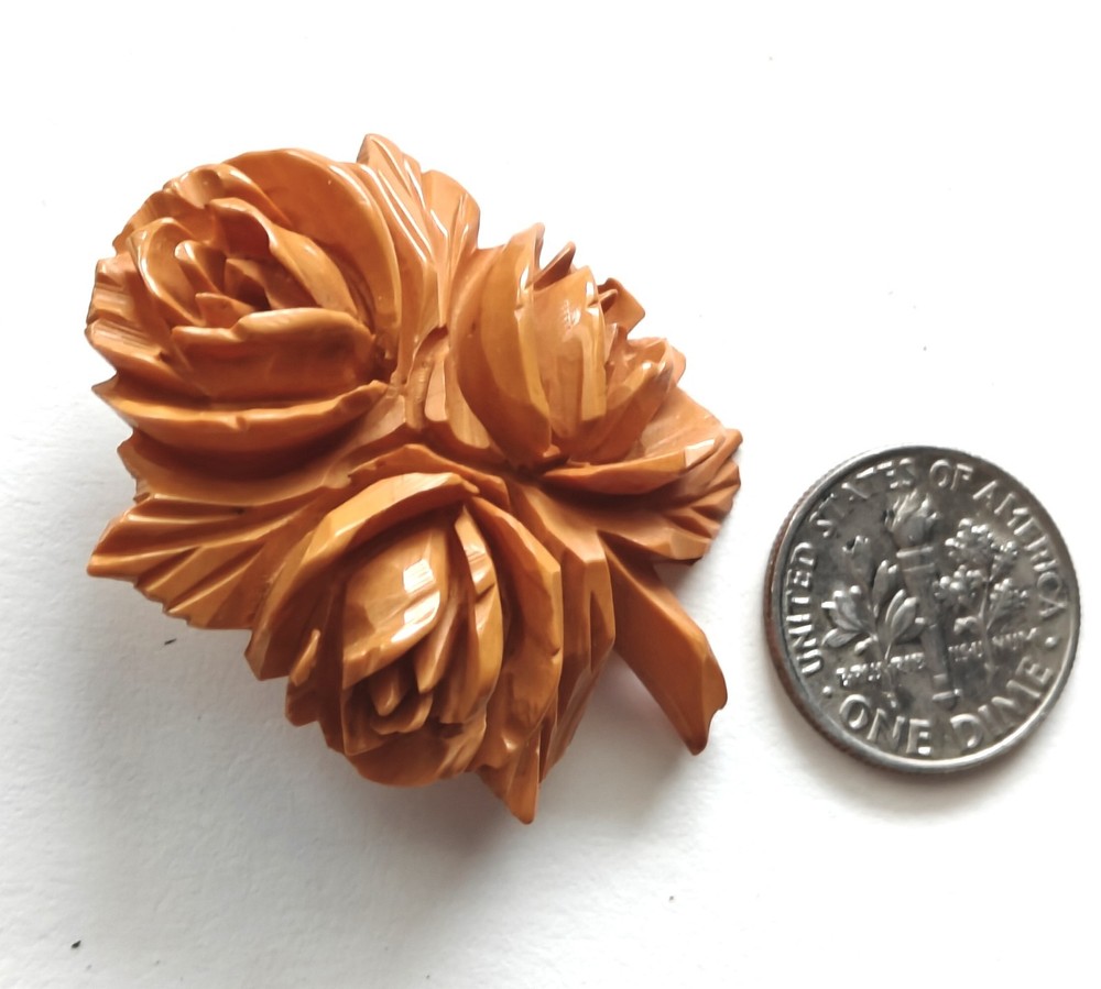 Deep Carved Bakelite Flower Brooch