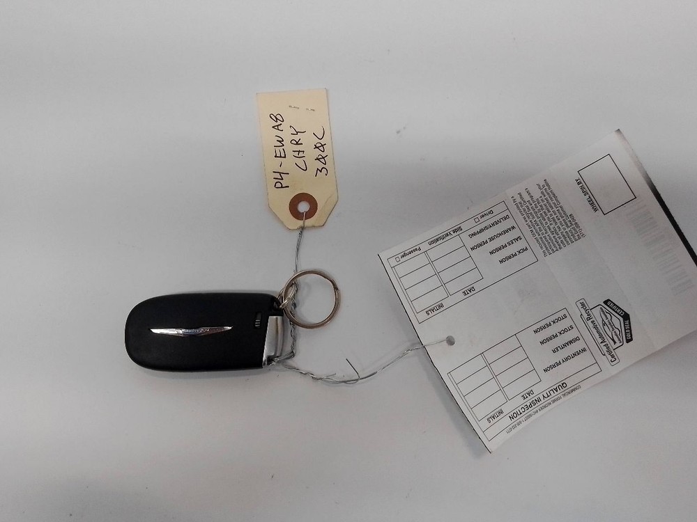 Five Button Fob/Remote from 2014 Chrysler 300 10983703