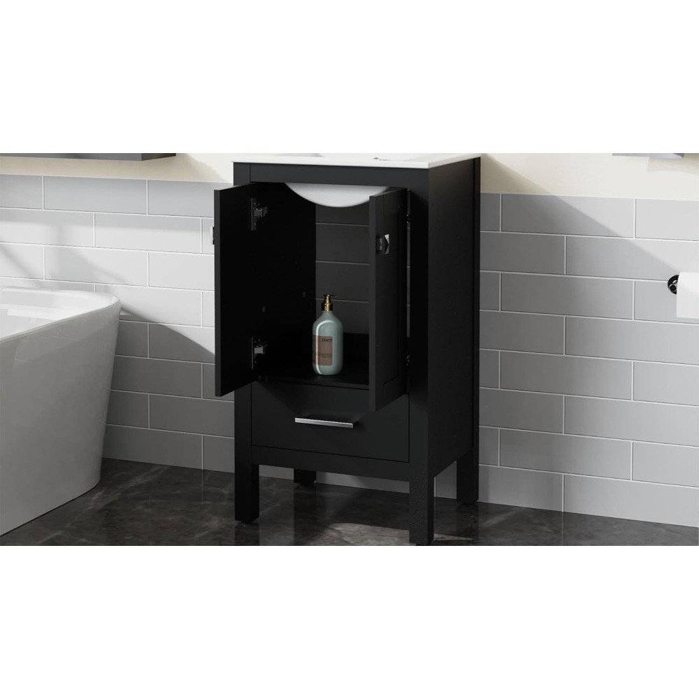 Bathroom vanity with white countertop and ceramic basin