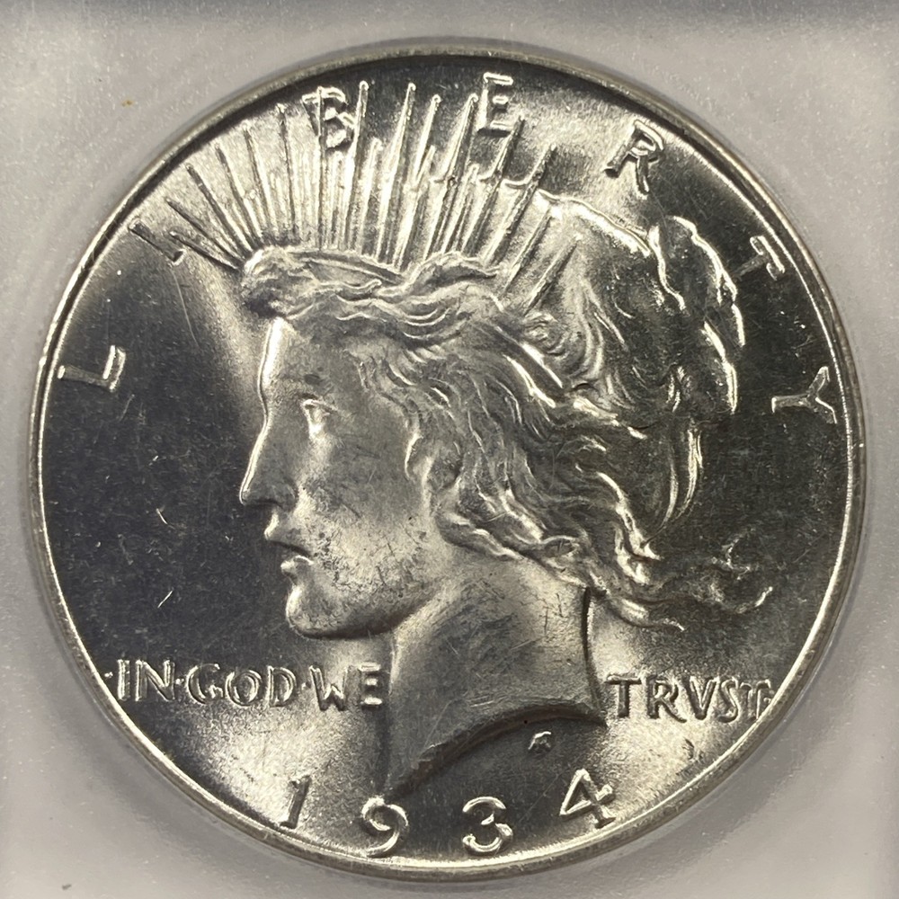 1934 Peace Silver Dollar 1.00. ICG MS 64.