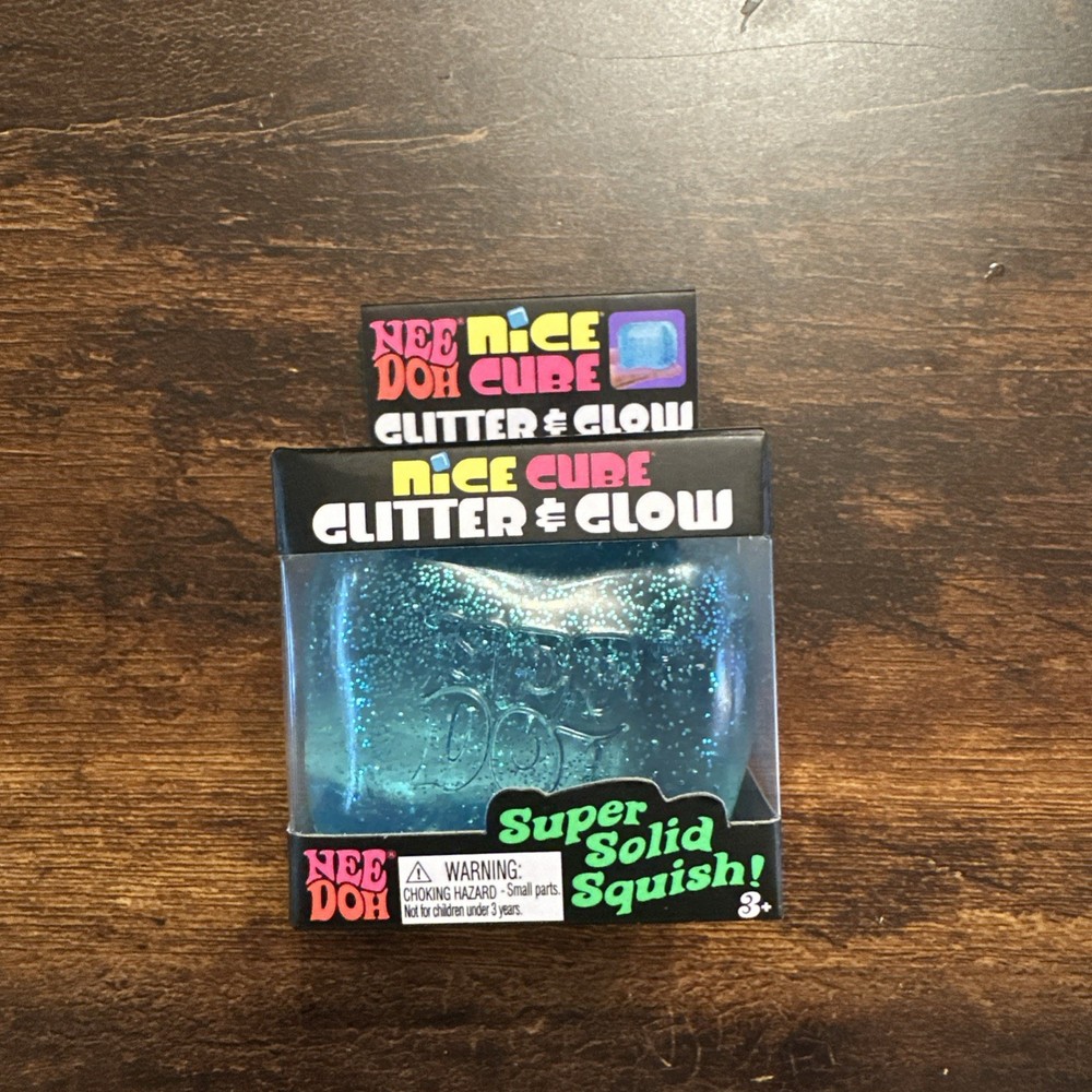 The Needoh Nice Cube Glitter & Glow BLUE, Super Solid Squish Ball