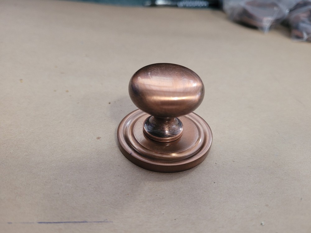 Colonial Bronze Antique Copper Round Knob With Backplate.