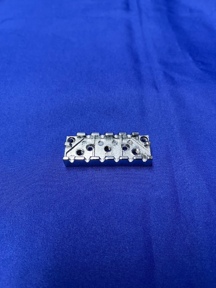 Locking Nut Wide Silver Base for an Electric Guitar