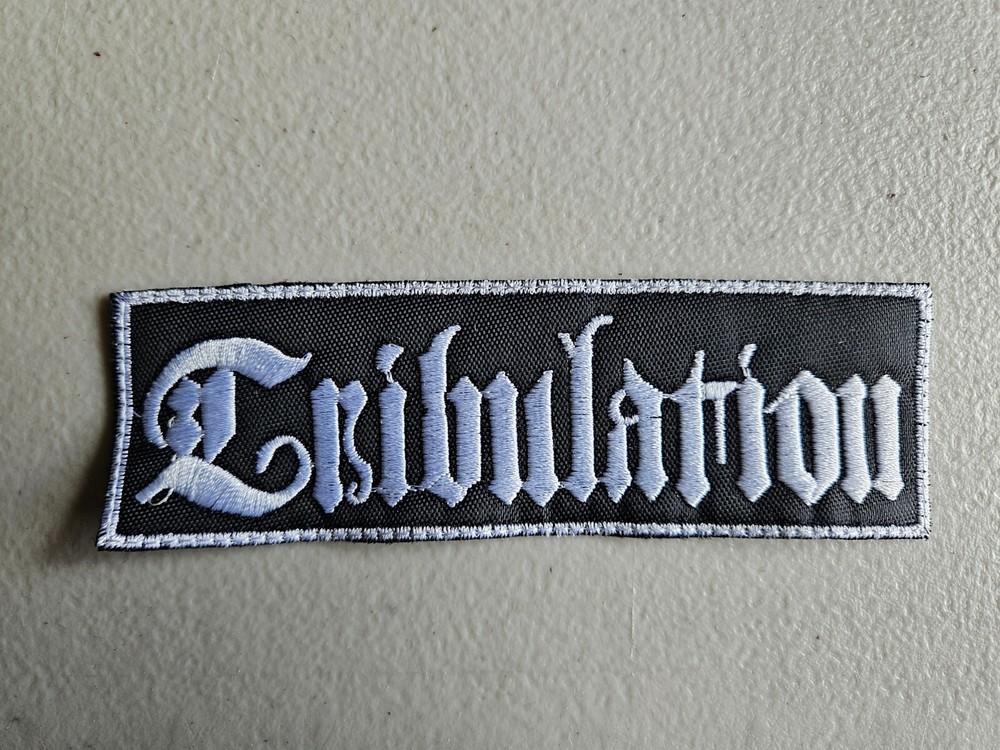 TRIBULATION, SEW ON WHITE EMBROIDERED PATCH