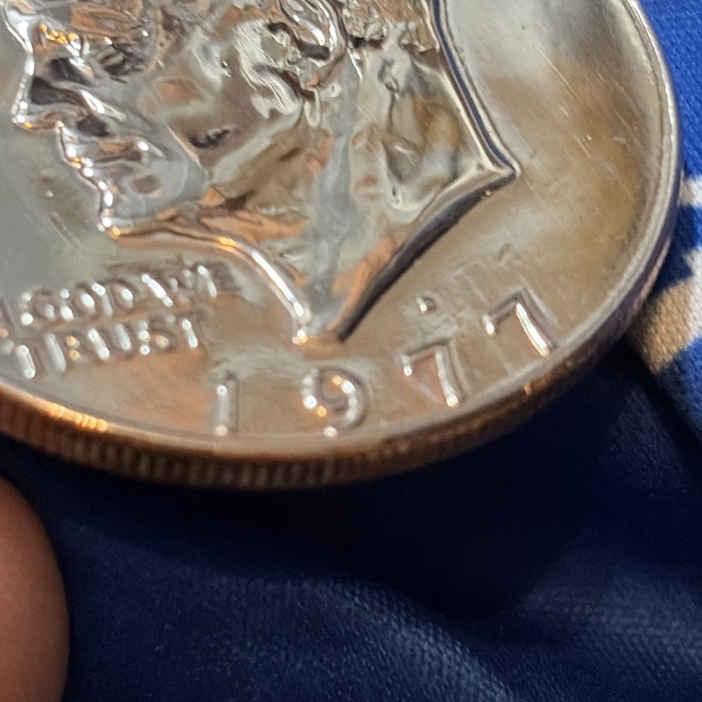 1977 Dollar Coin “Rare” D Minted filled d immaculate!