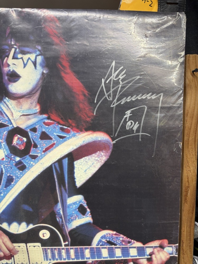 Ace Frehley Autographed Poster-24 X 36”