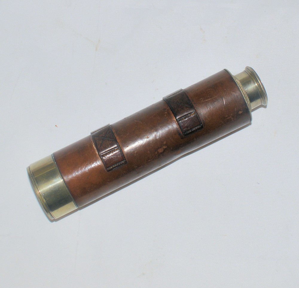 Telescope by E. & E. Emanuel with engraved nobility motif.