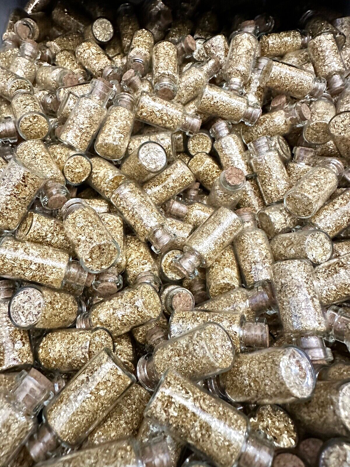 10 Bottles of Large Gold Flakes .....