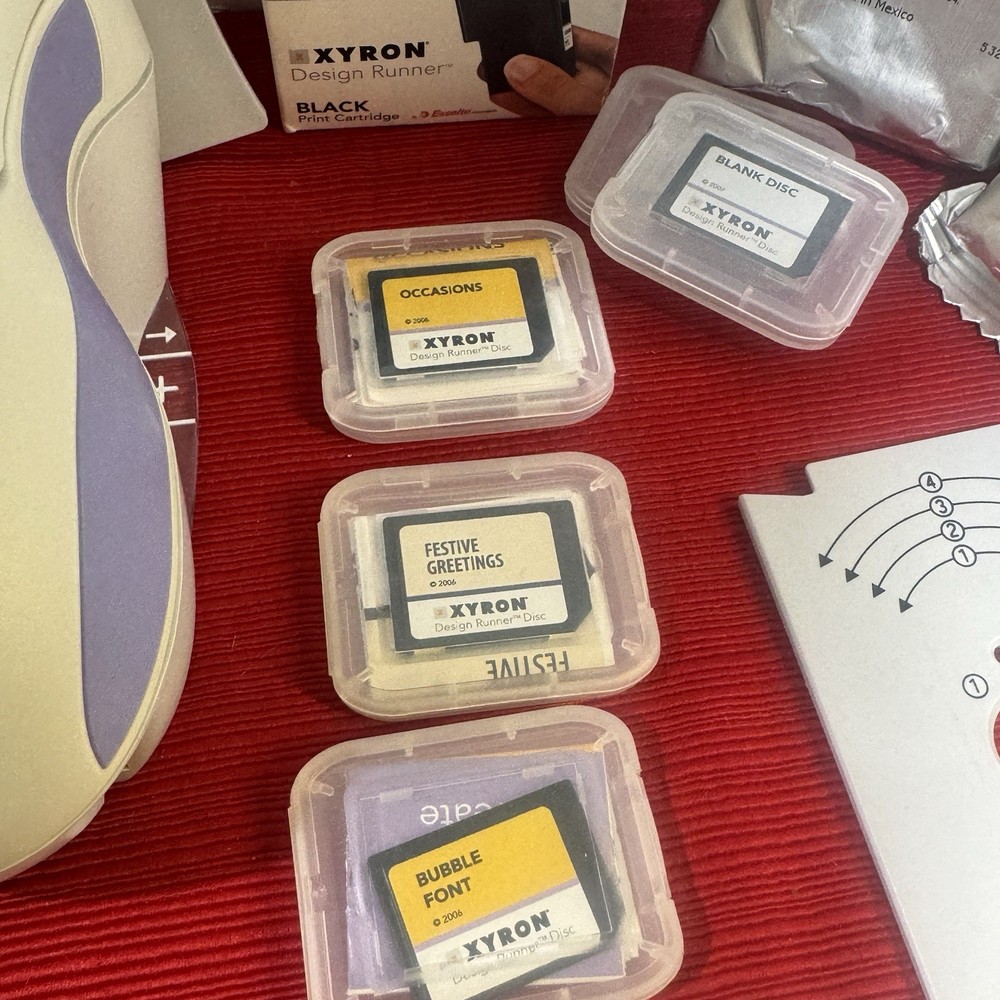 Xyron Design Runner Cordless Handheld Printer, Disc Maker, 6 Inks, 9 Design Disc