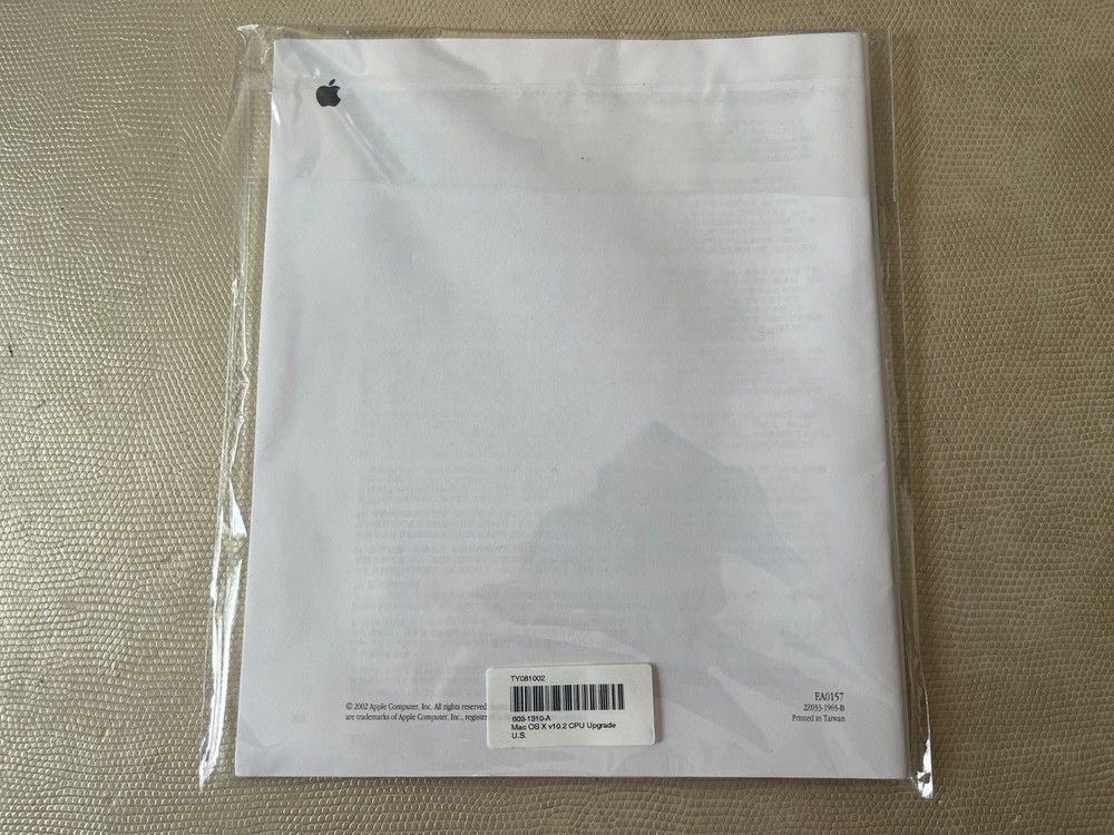 Mac OS X 10.2 Jaguar install discs + developer tools disc and Mac OS X manual