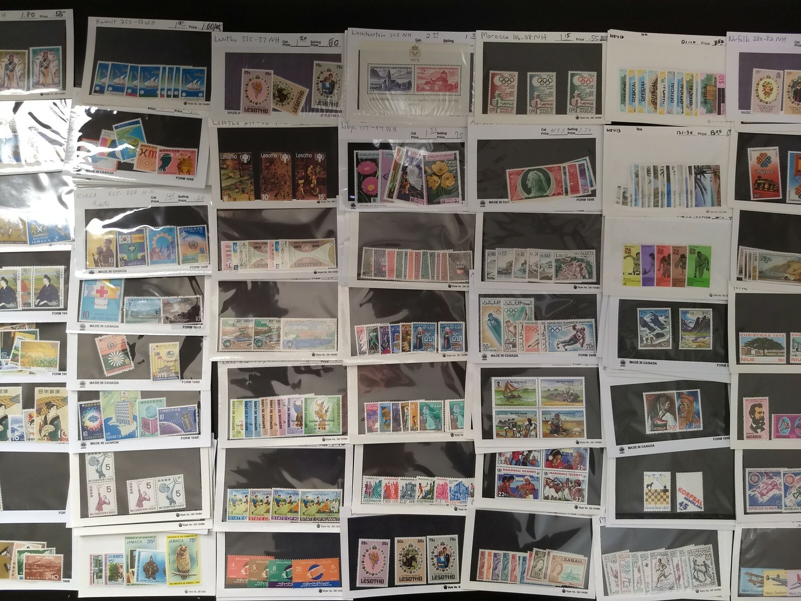 Worldwide Stamp Assortment Mint 100 Different Stamps from 20 Countries Full Sets