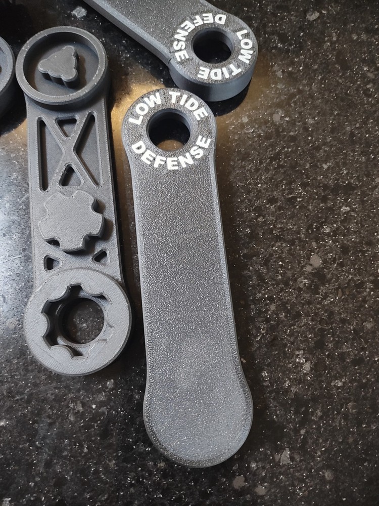 Rugged obsidian 9/45 suppressor tool.