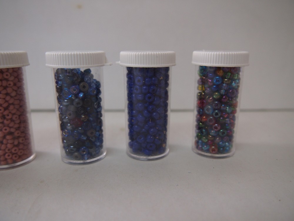 ASSORTED BEADS IN PLASTIC CONTAINERS