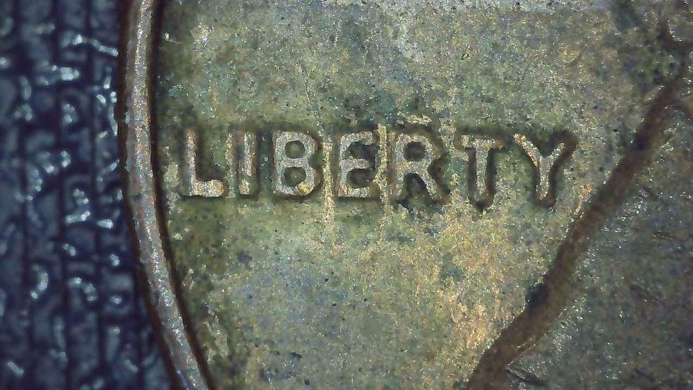 1981 Lincoln Penny error cracked die, misaligned die