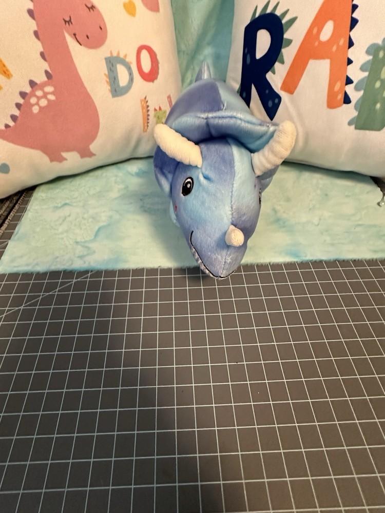 3 Crib Pillows And Dino stuffed toy