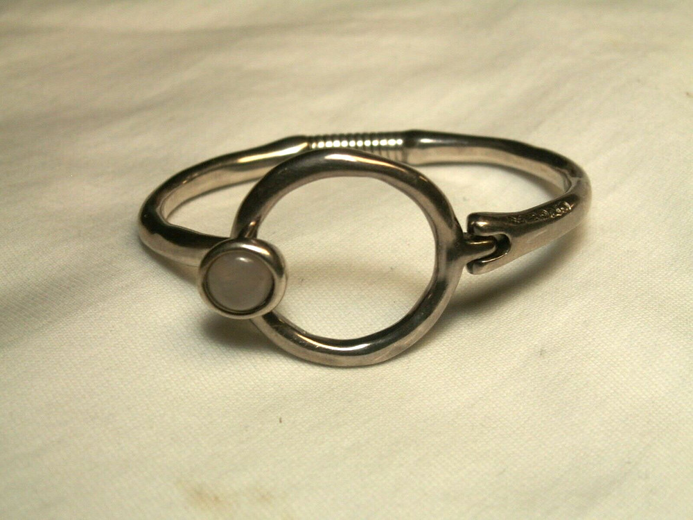 ...Unode50...Silver Tone, Quartz Hinged Bracelet...