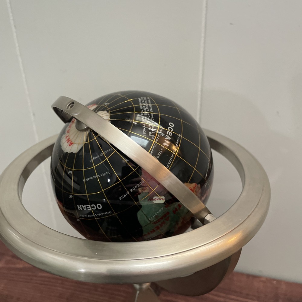 Rotating World Globe On Pyramid