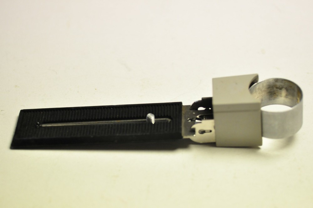 Honeywell flash bracket with collar to hold their handle mount flash.