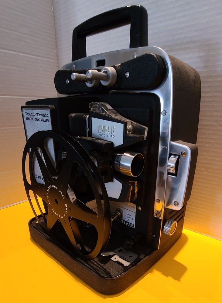 Bell and + Howell- Touch Tronic Lumina 1.2- Automatic Projector- Untested