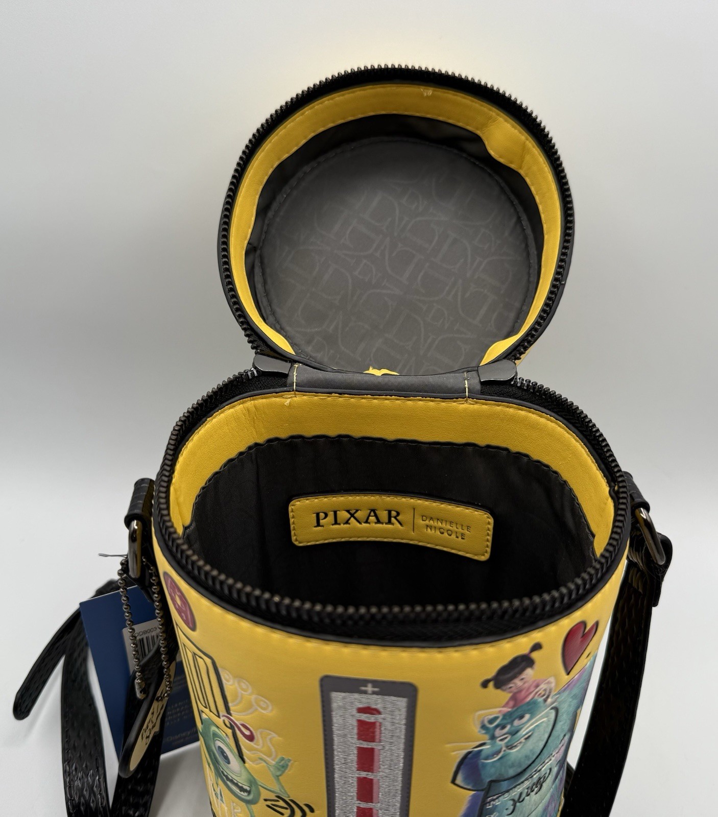 Danielle Nicole Pixar Monsters Inc Scream Laugh Canister Bag Crossbody Strap