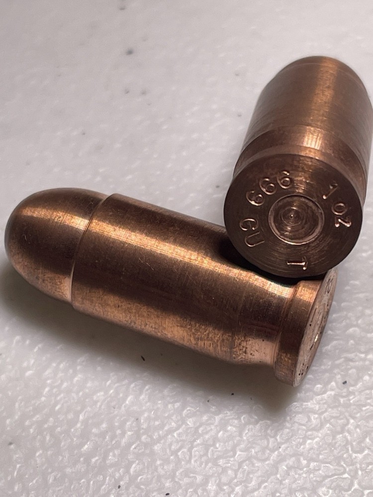 FINAL PAIR!!  2 X 1 Oz .999 Solid Copper Novelty Bullets by Silvertowne (toned)