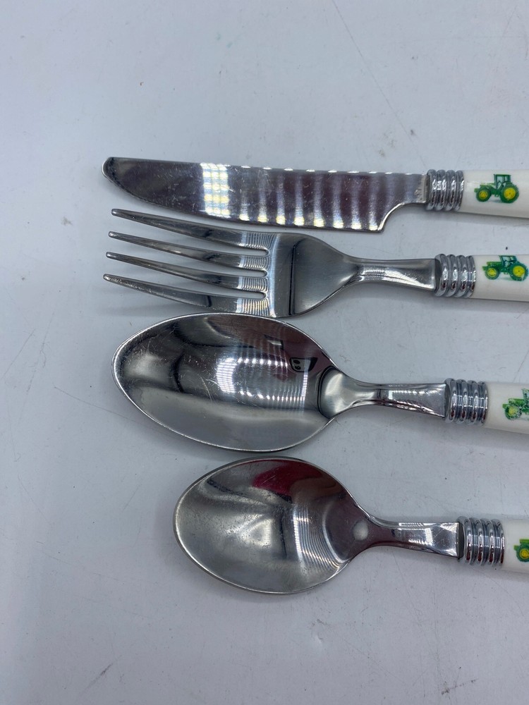 4 Piece Flateware John Deere tractor Gibson Dinner Knife 2-Spoons Fork Plastic