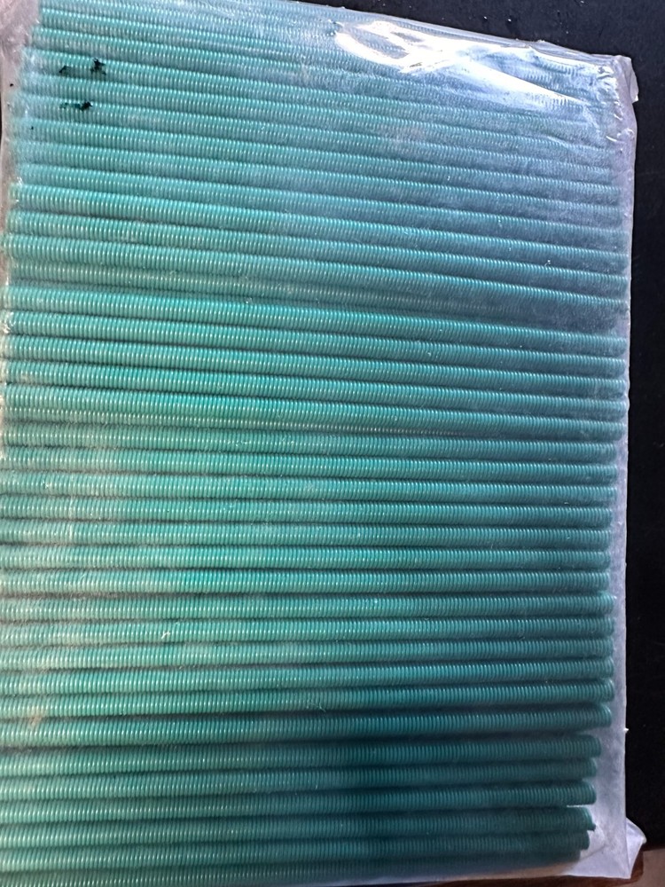 Green 2.3mm Polyester Spring Loop Protectors are packaged 500 pieces per bag