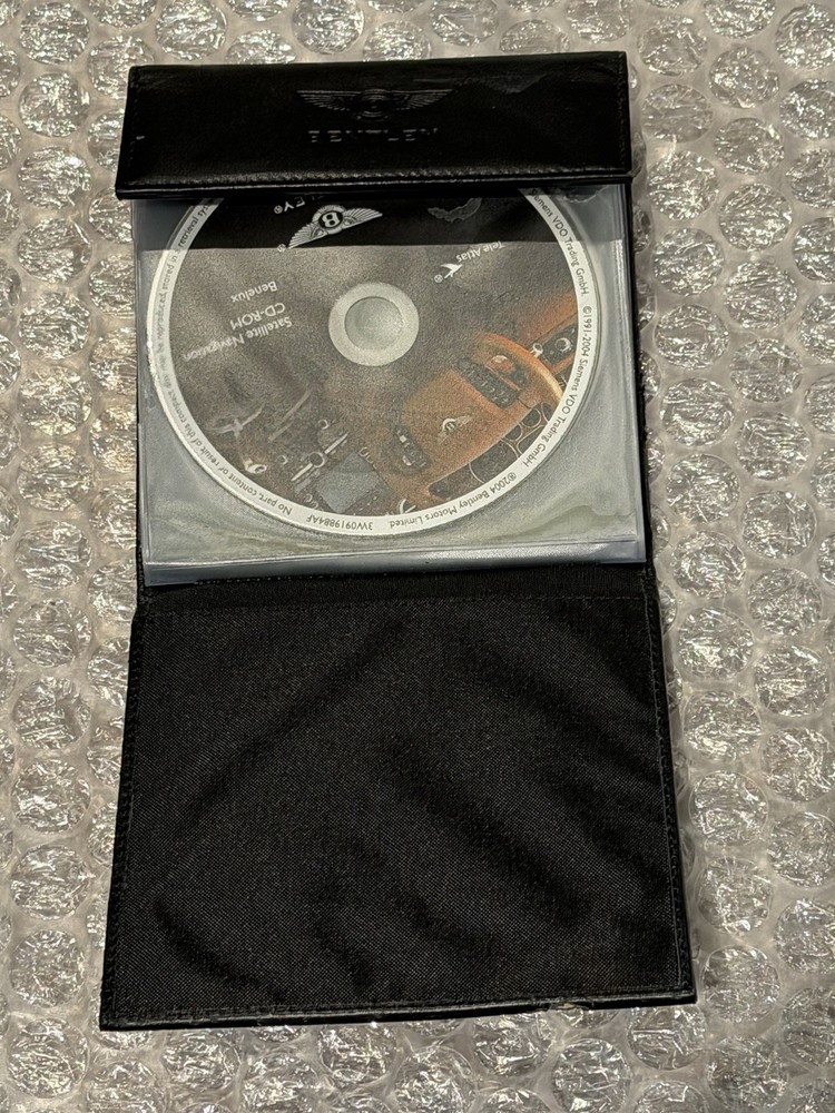 2004 Bentley Continental GT 7 Navigation Disc Set & Bentley Disc Case.