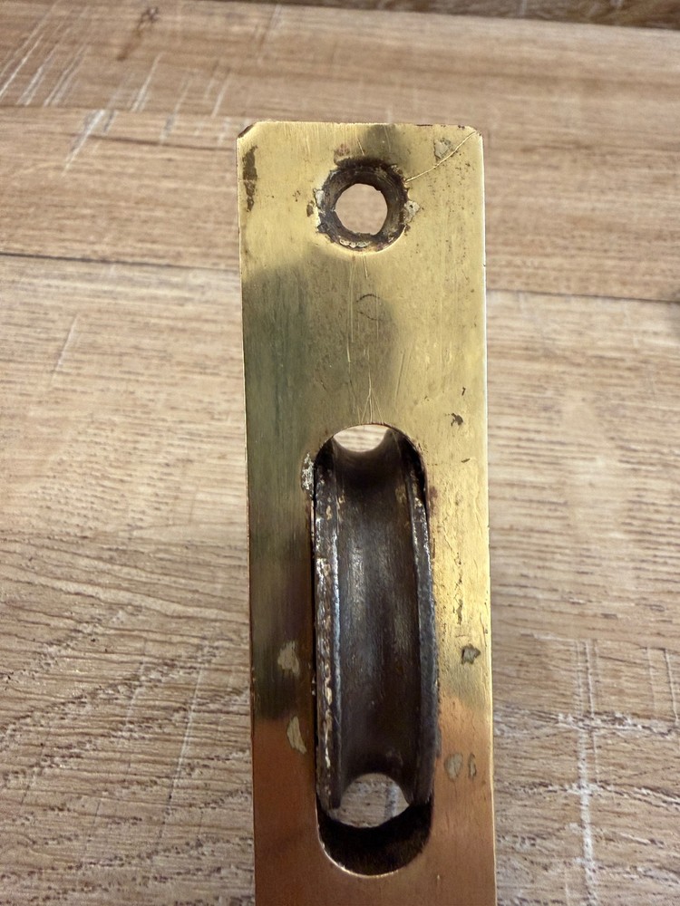 Two Antique Cast Iron, Brass Window Pulleys