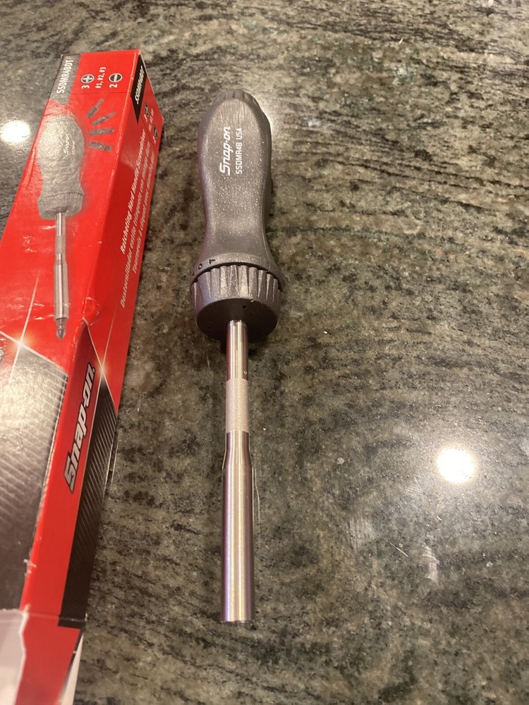 Snap On ssdmr4bdt ratcheting screwdriver with 5 bits dark titanium