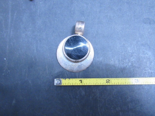 taxco black onyx pendants signed
