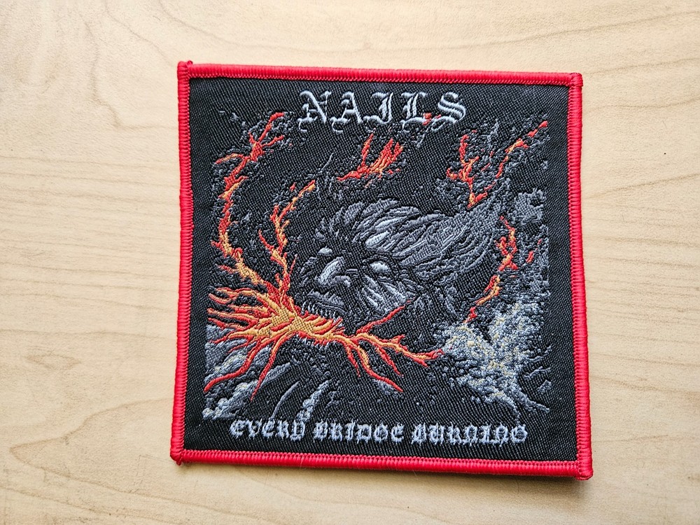 N.A.I.L.S, SEW ON RED BORDER WOVEN PATCH