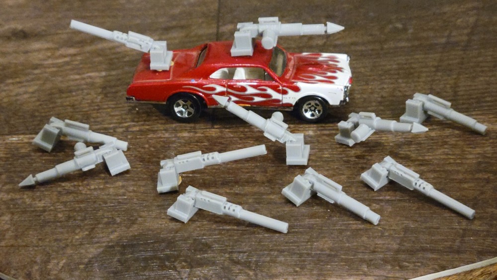 Adjustable, Moves Up or Down Weapons Pack Gray 3d printed. 1/64 scale. 11 items